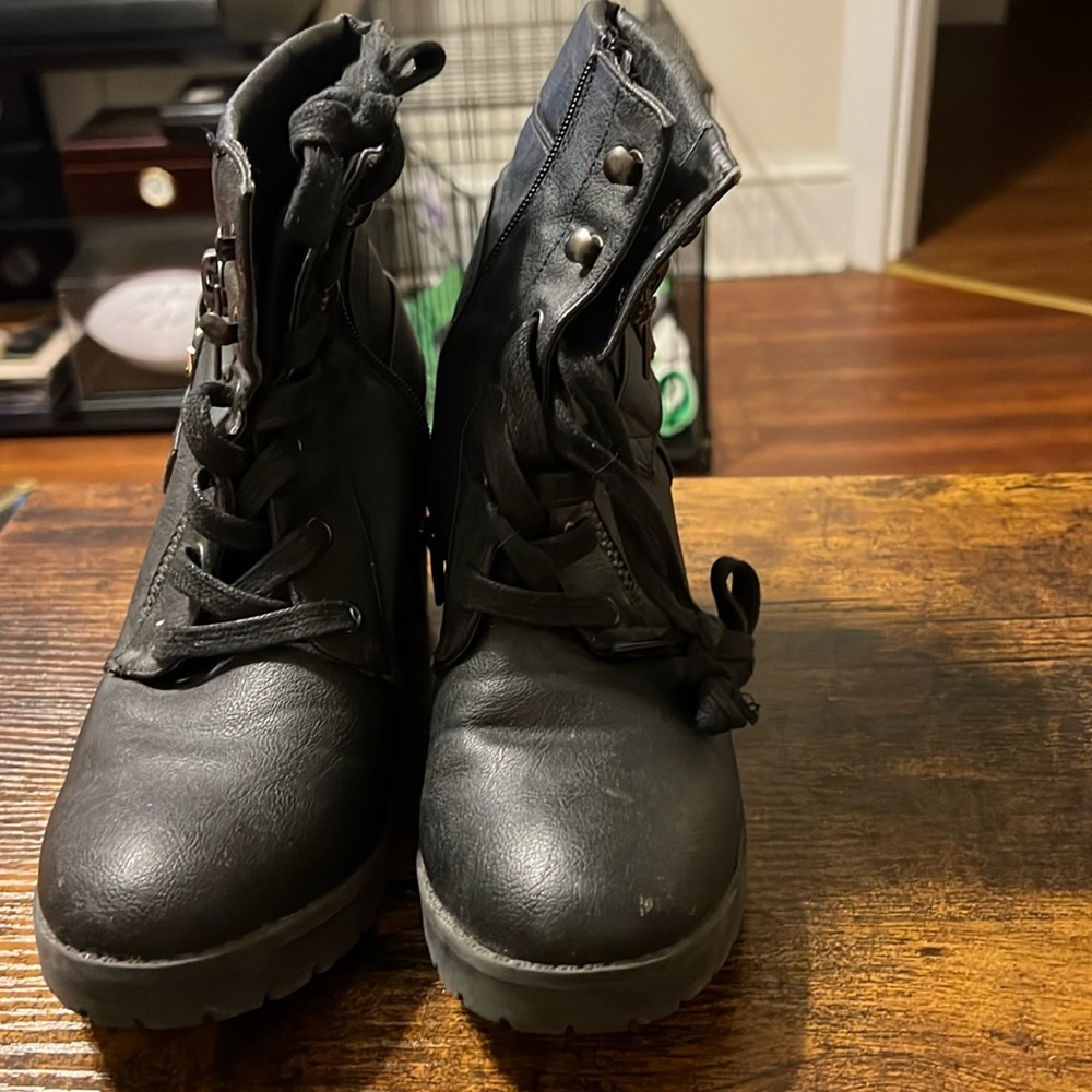 Edgy black heeled ankle boots.